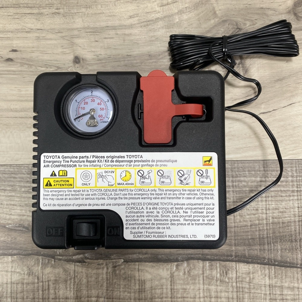 Toyota 9106 Emergency Tire Puncture Repair Kit Air Compressor Corolla No Sealant